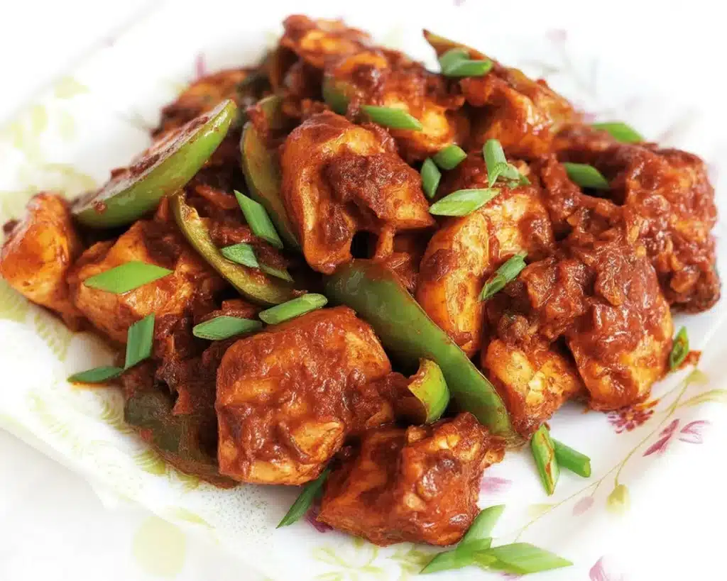Crispy Chili Chicken cooked with soy sauce, garlic, and aromatic spices.