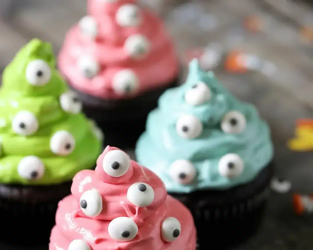 Spooky Monster Cupcakes with colorful frosting and fun decorations for Halloween