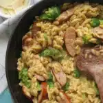 One-pot Chicken Sausage and Broccoli Orzo skillet with garlic and chicken broth.