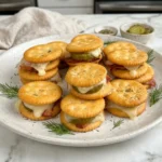 Bacon and pickle cheese bites on a platter, a crunchy appetizer