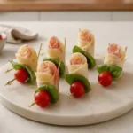 Edible garden flower skewers with savory roses and tortilla wraps.