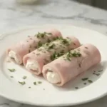 Delicious ham and cream cheese roll-ups, perfect for quick snacks or appetizers.