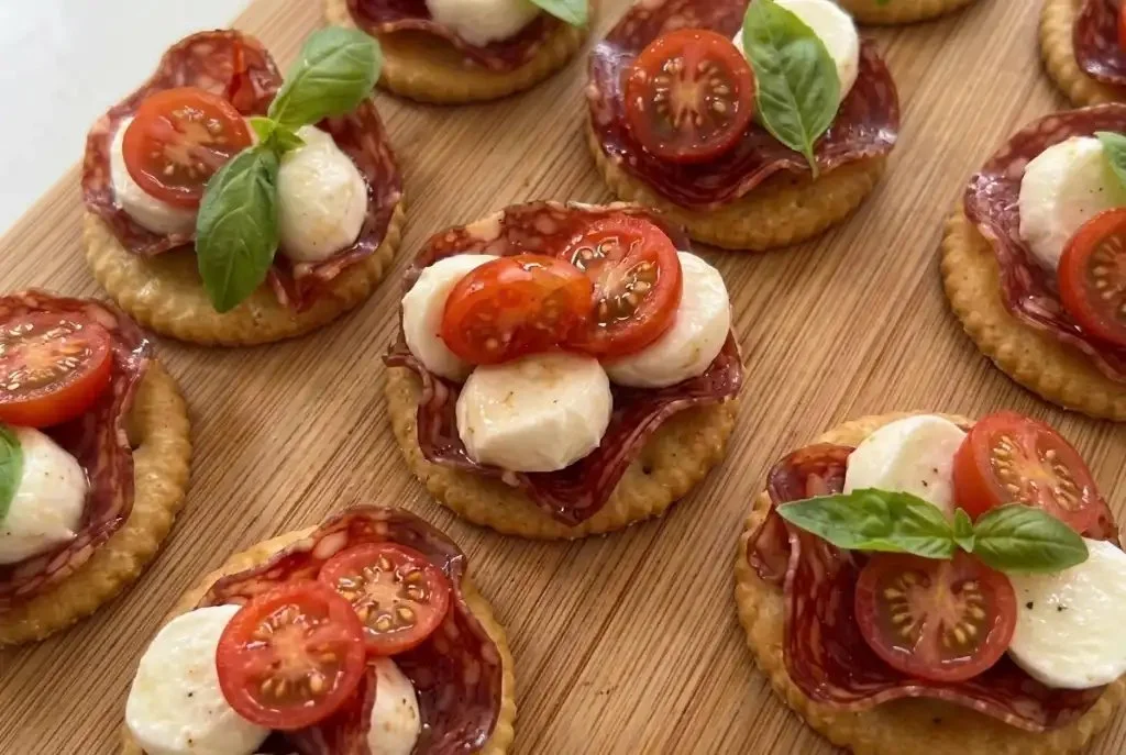 Assorted easy party bites for game day snacks and holiday grazing boards