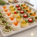 Elegant party appetizers with cream cheese-topped bread rounds and roasted mushrooms