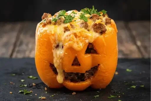 Delicious stuffed peppers with ground beef and melted cheese, perfect for fall dinners.