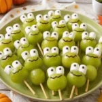 Halloween Grape Frog Pops with green grapes and marshmallow eyes