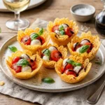 Low-Carb Caprese Appetizer Baskets in crispy parmesan cups