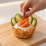 Smoked salmon and cream cheese appetizer cups for elegant party presentations.