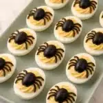 Spooky spider deviled eggs decorated for Halloween fun