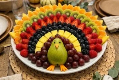 Colorful turkey fruit platter designed for kids' healthy snacks and Thanksgiving celebrations.